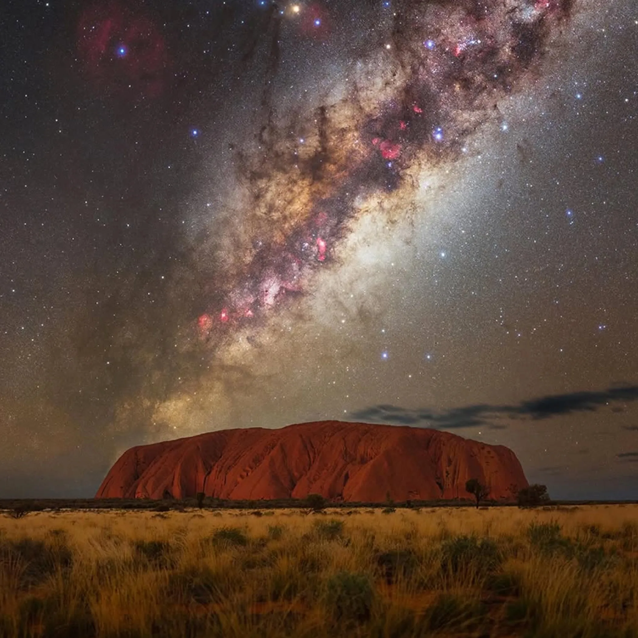 uluru under a star-filled sky